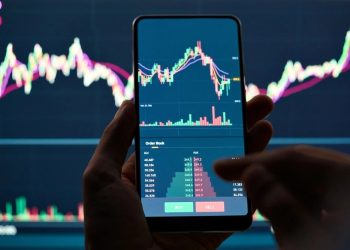 Ini Perbedaan Trading dan Investasi Saham