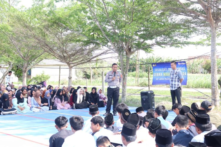 Satlantas Polres Lampung Selatan Adakan Sosialisasi Operasi Zebra Krakatau 2024 di SMKN 1 Way Panji