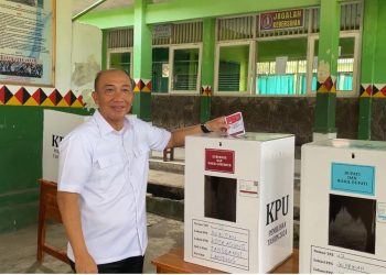 PJ Bupati Tanggamus Gunakan Hak Pilih di TPS 12, Suasana Kondusif dan Antusias