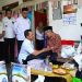 Bupati Pringsewu Serahkan Bantuan untuk Keluarga PMI Almarhum Dedi